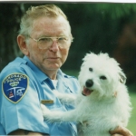 Don Carney, Coronado's former Animal Care Officer, with Sausage